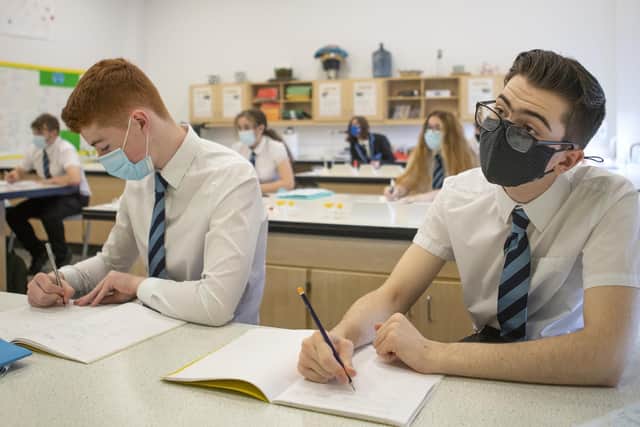 Pupils wearing masks in the classroom (photo: PA).