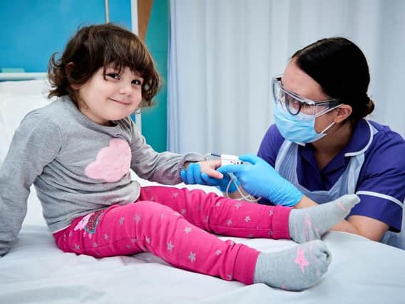 A nurse tends to a young patient at Leeds Children's Hospital. Picture: Leeds Teaching Hospitals Trust