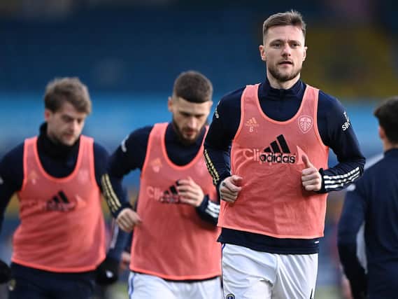 Leeds United club captain Liam Cooper warms up at Elland Road. Pic: Getty