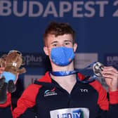 Great Britain's Jack Laugher with his silver medal after the men's 1m springboard final at the Diving event during the European Aquatics Championships. Picture: Attila Kisbenedek/Getty Images.
