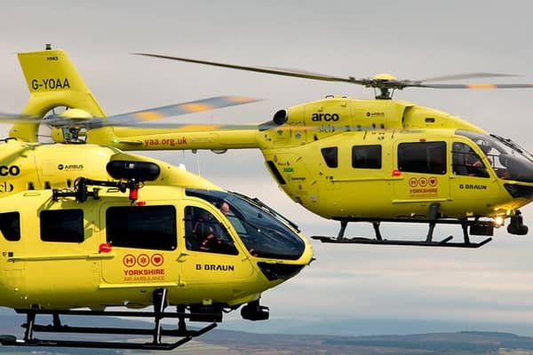 The two current helicopters in flight