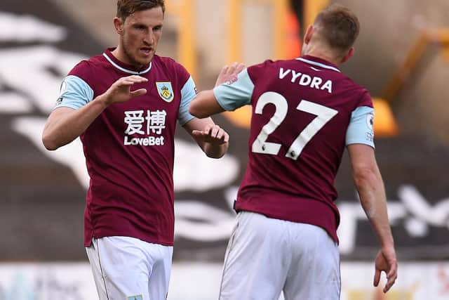 FRONT TWO: Burnley strike force duo Chris Wood, left, and Matej Vydra, right. Photo by OLI SCARFF/POOL/AFP via Getty Images.