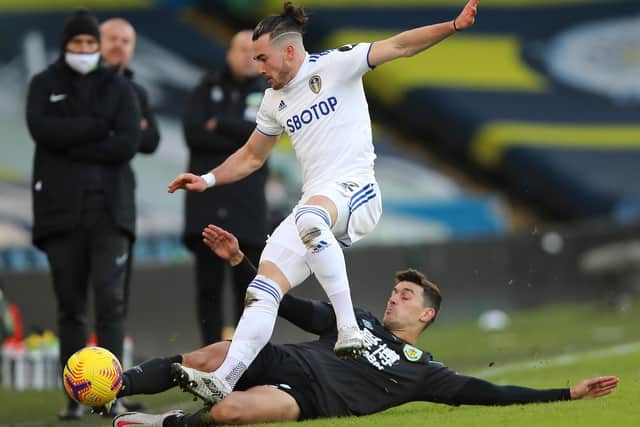 WE'LL MEET AGAIN: Leeds United winger Jack Harrison is challenged by Burnley right back Matt Lowton during December's Premier League clash at Elland Road. Photo by Molly Darlington - Pool/Getty Images.