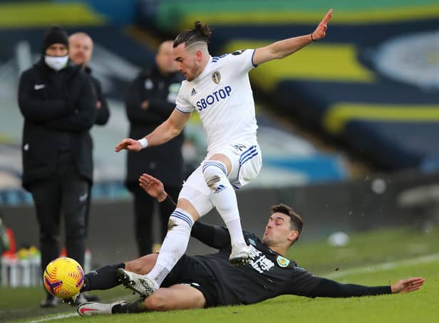 WE'LL MEET AGAIN: Leeds United winger Jack Harrison is challenged by Burnley right back Matt Lowton during December's Premier League clash at Elland Road. Photo by Molly Darlington - Pool/Getty Images.