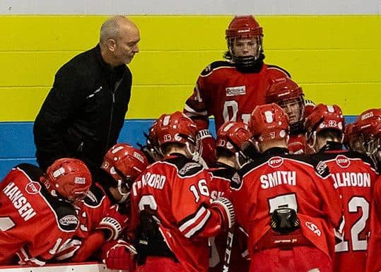 DEVELOPMENT: Dave Whistle, pictured with youngsters at the Okanagan Hockey Academy in Penticton, British Columbia. Picture courtest of OHA.