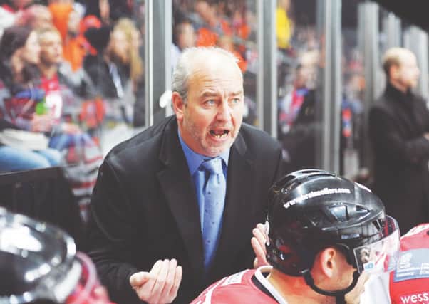 EXPERIENCED: Dave Whistle, pictured behind the Cardiff Devils bench during a brief return to South Wales in 2014. Picture courtesy of Richard Murray/Cardiff Devils.