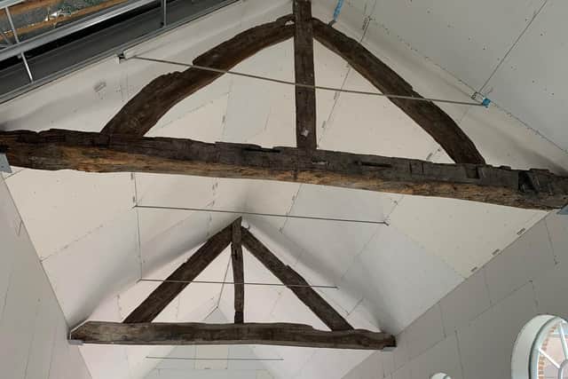 Contractors discovered the oak wooden trusses that they believe are more than 500 years old in February 2021. Photo: Rushbond