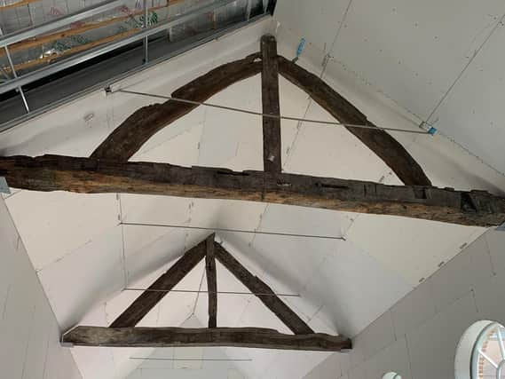Contractors discovered the oak wooden trusses that they believe are more than 500 years old in February 2021. Photo: Rushbond