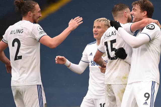ALL SMILES: Leeds United striker Patrick Bamford, right, celebrates with his team mates after netting his side's second goal in last weekend's impressive 3-1 victory against Tottenham at Elland Road. Photo by Oli Scarff - Pool/Getty Images.