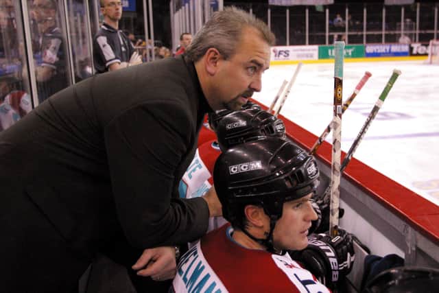 WINNER: Dave Whistle, pictured on the Belfast Giants' bench with defenceman Todd Kelman at the Odyssey Arena during their 2001-02 Superleague winning campaign. Picture: Michael Cooper/Getty Images