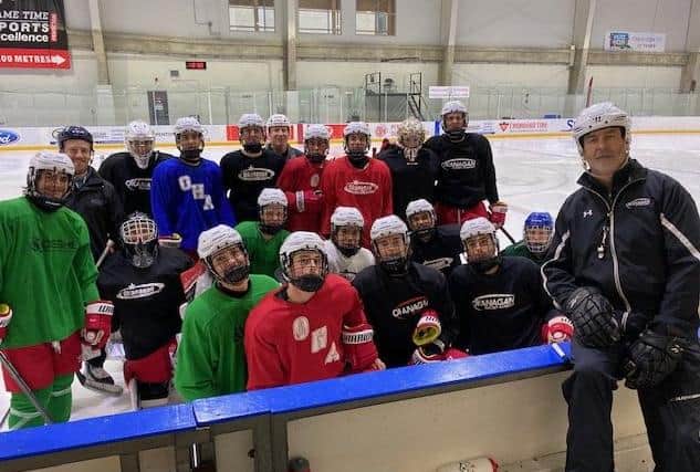 THE RIGHT MAN: Dave Whistle, right, with some youngsters from the Okanagan Hockey Academy in Penticton, where he has worked for the last six years. Picture courtesy of OHA.