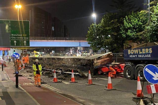 The concrete section of the bridge fell off the trailer onto the road (Photo: Jay Dominic)