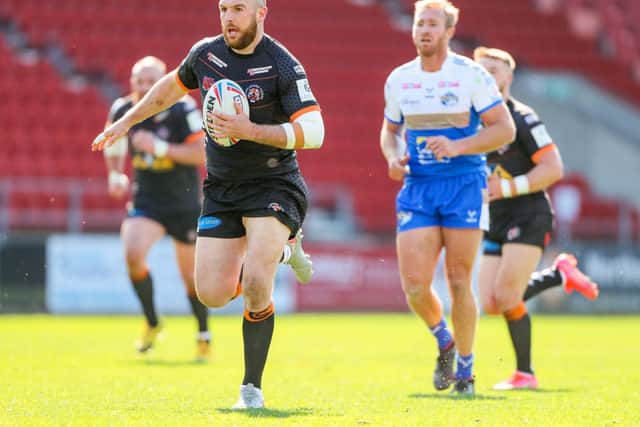 Castleford Tigers' Daniel Smith in action against Leeds Rhinos. (Alex Whitehead/SWpix.com)