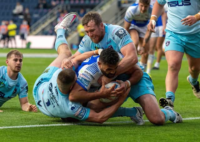 Rhyse Martin scores Leeds Rhinos' first try against Wakefield Trinity. Picture: Bruce Rollinson.