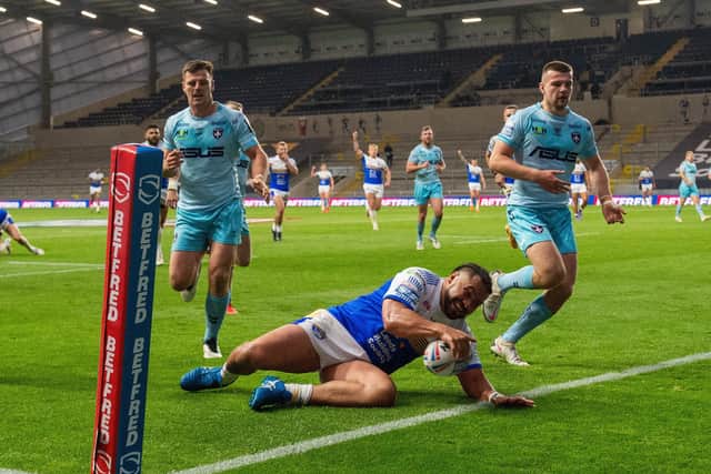 Konrad Hurrell scores Rhinos' second try against Wakefield Trinity. Picture: Bruce Rollinson.