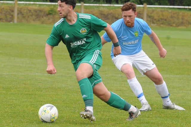 Sam Akeroyd, of Beeston St Anthonys, turns Hunslet's Killian Mabey. Picture: Steve Riding.