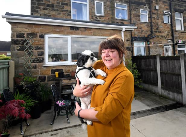 Foster carer Rachel Charlton pictured with her dog Leo at her home at Rothwell.

Photo: Simon Hulme