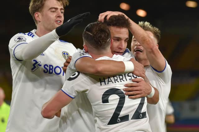 OPTIONS: Leeds United winger Jack Harrison, right, hugging record signing Rodrigo as top scorer Patrick Bamford, left, moves in during December's victory at home to Newcastle United. Photo by Rui Vieira - Pool/Getty Images.