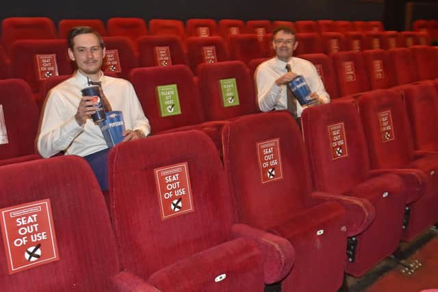 Gary Benn (left) manager of Cottage Road Cinema and Steven Moore, assistant manager in the marked out seats
Photo: Steve Riding