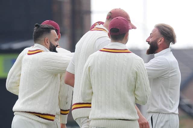 Yasir Ali, right, celebrates after dismissing Morley batsman Henry Rush first ball after trapping Jack Rowett LBW. The rains then came and Yasir will have to wait till next Saturday against New Farnley to bowl his hat-trick ball. Picture: Steve Riding.