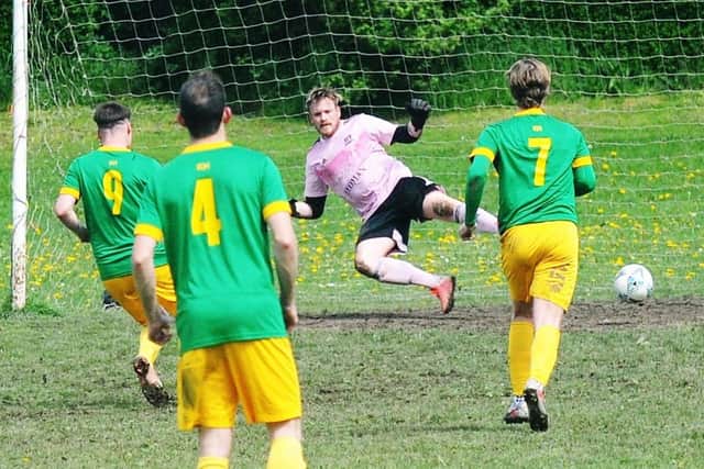 Mark Ferguson scores for Main Line Social in the Leeds Combination League Jubilee Premier clash with HT Sports. Picture: Steve Riding.