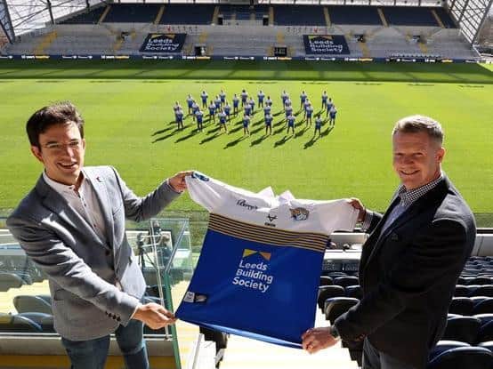 Rhinos commercial director Rob Oates, right, with Phil Fearon, chief executive of Leeds Building Society who have extended their sponsorship of the club despite the pandemic.