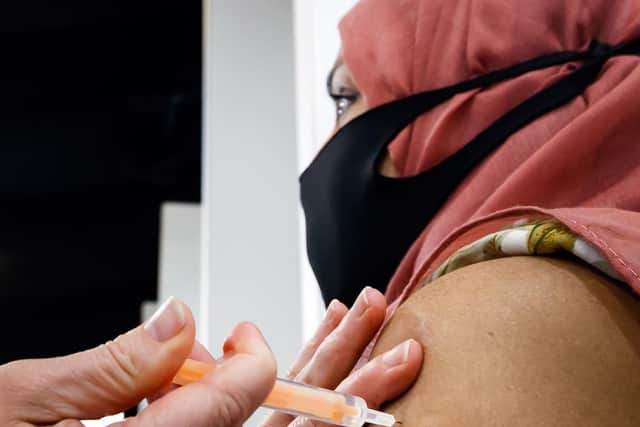 A woman received her jab at the Elland Road vaccine centre in Leeds. Picture: Danny Lawson/PA