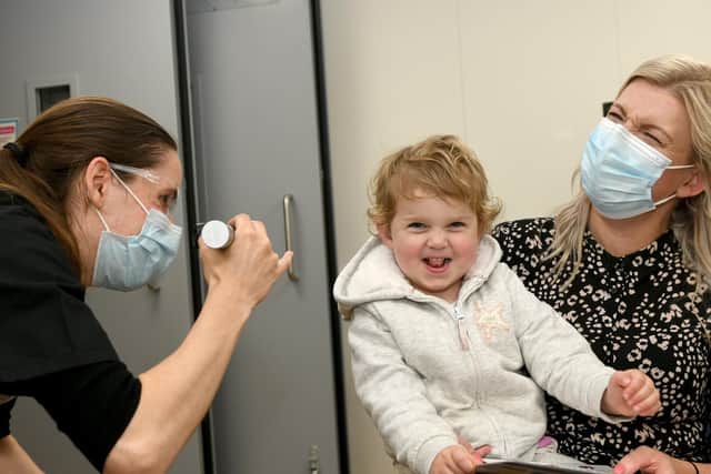 Young Patient Poppy Whittaker, three, of Leeds with her mum Katie at the new Hearing and Balance Service at Seacroft Hospital being examined by Jennifer Pyne, Paediatric Audiologist. Picture: Gary Longbottom