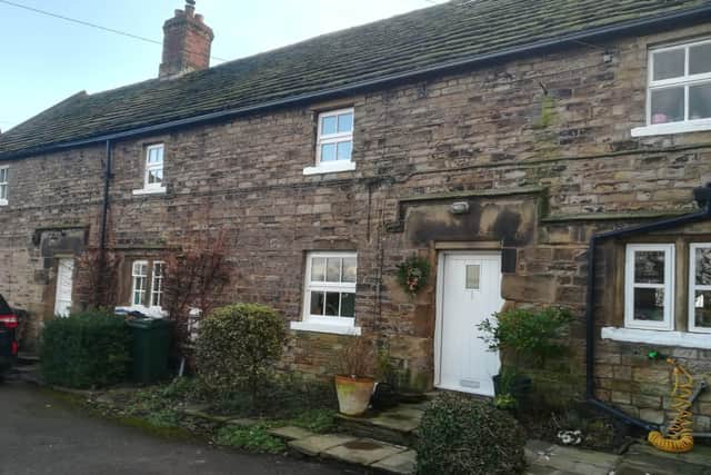 The cottages where the two eight- year-old victims - John HInchliffe and Charles Forden - lived at the time of the disaster. The shaft involved was very close to the cottages.