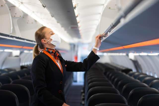 Crew prepare the first holiday and leisure flight for take-off at Gatwick Airport,
