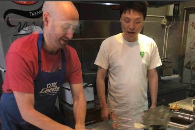Li Zhu has international staff working at Leeds Pizza for extra authenticity.