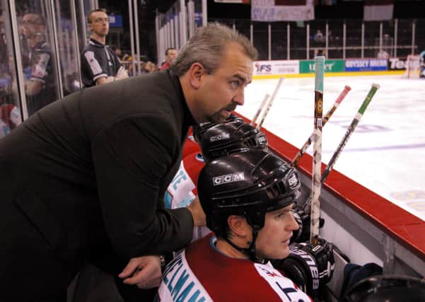 SUCCESS STORY: Dave Whistle, left, pictured talking to defenceman Todd Kelman at the Odyssey Arena in the 2001-02 Superleague campaign, which saw Belfast Giants win the regular season title. Picture: Michael Cooper/Getty Images.