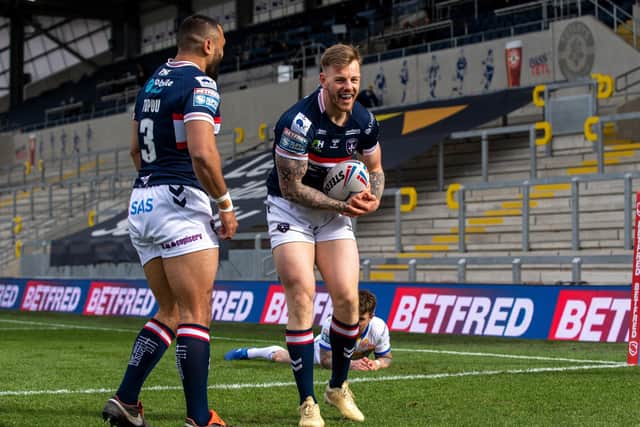 Tom Johnstone scores Wakefield's opening try against Leeds Rhinos on the opening night of Super League (Picture: Bruce Rollinson)