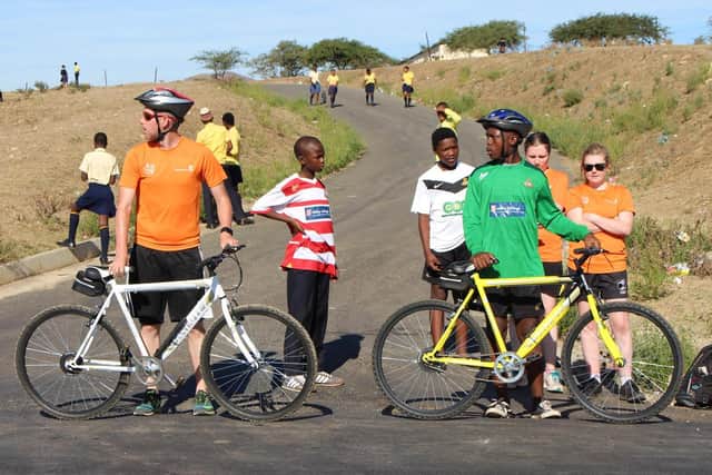 People taking part in the The Bambisanani ‘Cycling to Success’ project.