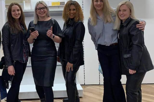 Sara Mutter, second from left, with her team.
