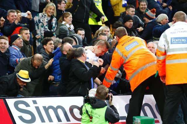 Pontus Jansson celebrates with the travelling support after scoring for Leeds United at Carrow Road in November 2016. PIC: Varley Picture Agency