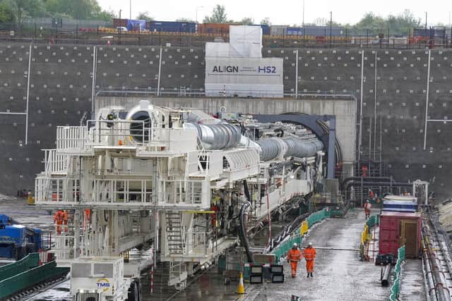 Florence - the largest ever tunnel boring machine used on a UK rail project - is unveiled at the HS2 site in West Hyde near Rickmansworth in Hertfordshire. Picture date: Thursday May 13, 2021. PA Photo. Named after nursing pioneer Florence Nightingale, The 558ft (170m) long contraption will dig a 10-mile (16km) tunnel under the Chiltern Hills, starting from a site in Buckinghamshire near the M25 motorway. Pic: PA