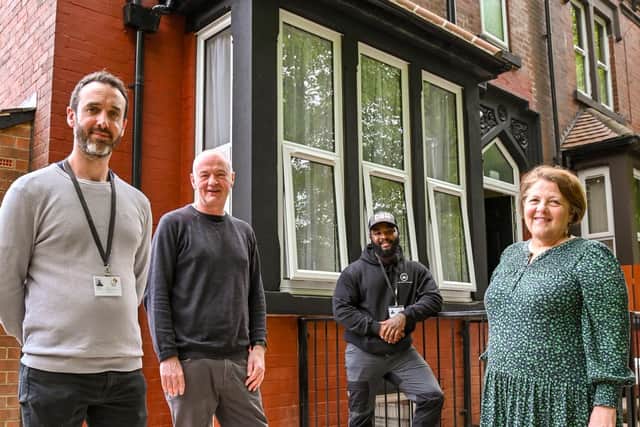 The front of the house after the renovation - pictured: Joe Brown (refurb team manager), James Hartley (Latch CEO), Ryan Jeffers (refurb worker), Councillor Jane Dowson