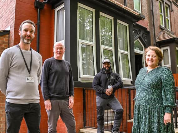 The front of the house after the renovation - pictured: Joe Brown (refurb team manager), James Hartley (Latch CEO), Ryan Jeffers (refurb worker), Councillor Jane Dowson