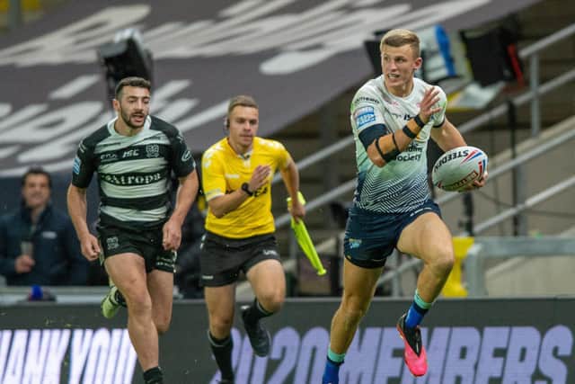 Ash Handley speeds away to score his hat-trick try in Rhinos' win over Hull last October. Picture by Bruce Rollinson.