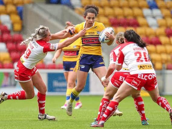 Tara Moxon in possession for Rhinos during their semi-final loss to St Helens. Picture by Alex Whitehead/SWpix.com.