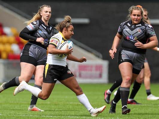 York's Kelsey Gentles on the attack against her former club Castleford. Picture by Alex Whitehead/SWpix.com.