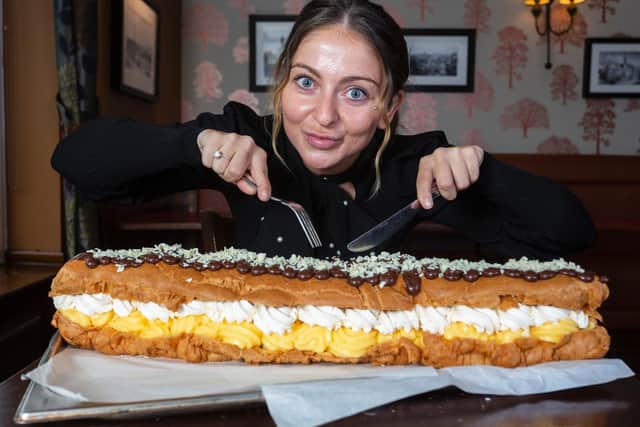 Jamie Wilson, 27, has challenged dessert lovers to try to tame the ‘eclair to end all eclairs’ - but said the dessert would scare even the most sweet toothed among us.
cc SWNS