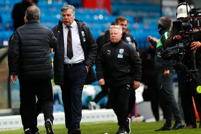 DISAPPOINTED: Outgoing West Brom boss Sam Allardyce, centre, interacts with Leeds United head coach Marcelo Bielsa, left, after Sunday's 3-1 defeat at Elland Road. Photo by Lynne Cameron - Pool/Getty Images.