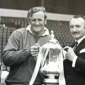 Geoff Williams with Leeds United manager Don Revie holding the FA Cup