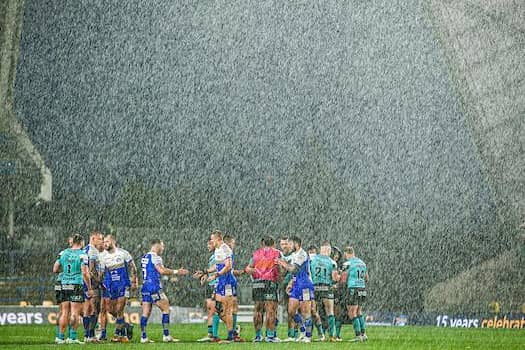 Torrential rain struck at the end of Sunday's game. Picture by Alex Whitehead/SWpix.