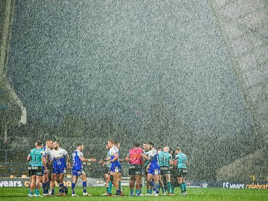 Torrential rain struck at the end of Sunday's game. Picture by Alex Whitehead/SWpix.