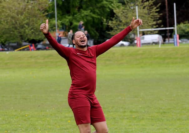 Little London's Kyle Jefferey celebrates scoring late to ensure a 3-0 win over Leeds Combination League Division 3 title rivals Old Crooked Clock. Pictures: Steve Riding.