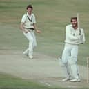Ian Botham smiles as he hits out off the bowling of Geoff Lawson during the second innings of the 3rd Cornhill Test match in July 1981. PIC: Getty