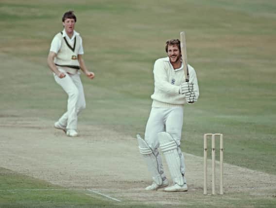 Ian Botham smiles as he hits out off the bowling of Geoff Lawson during the second innings of the 3rd Cornhill Test match in July 1981. PIC: Getty